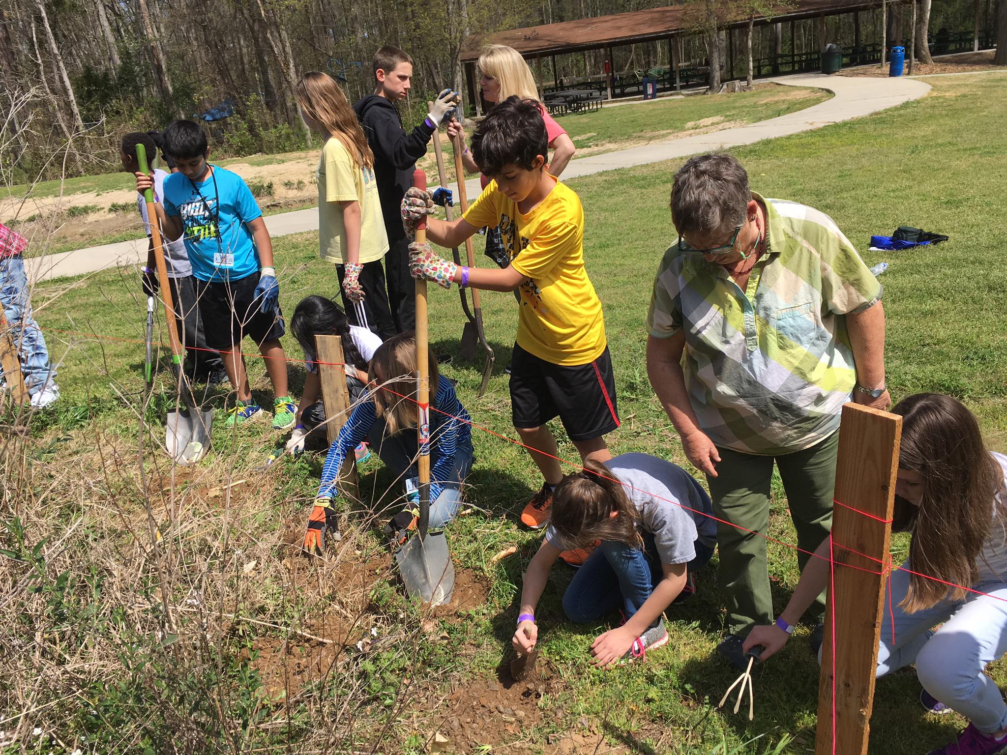 Students planting Milkweed for Monarchs